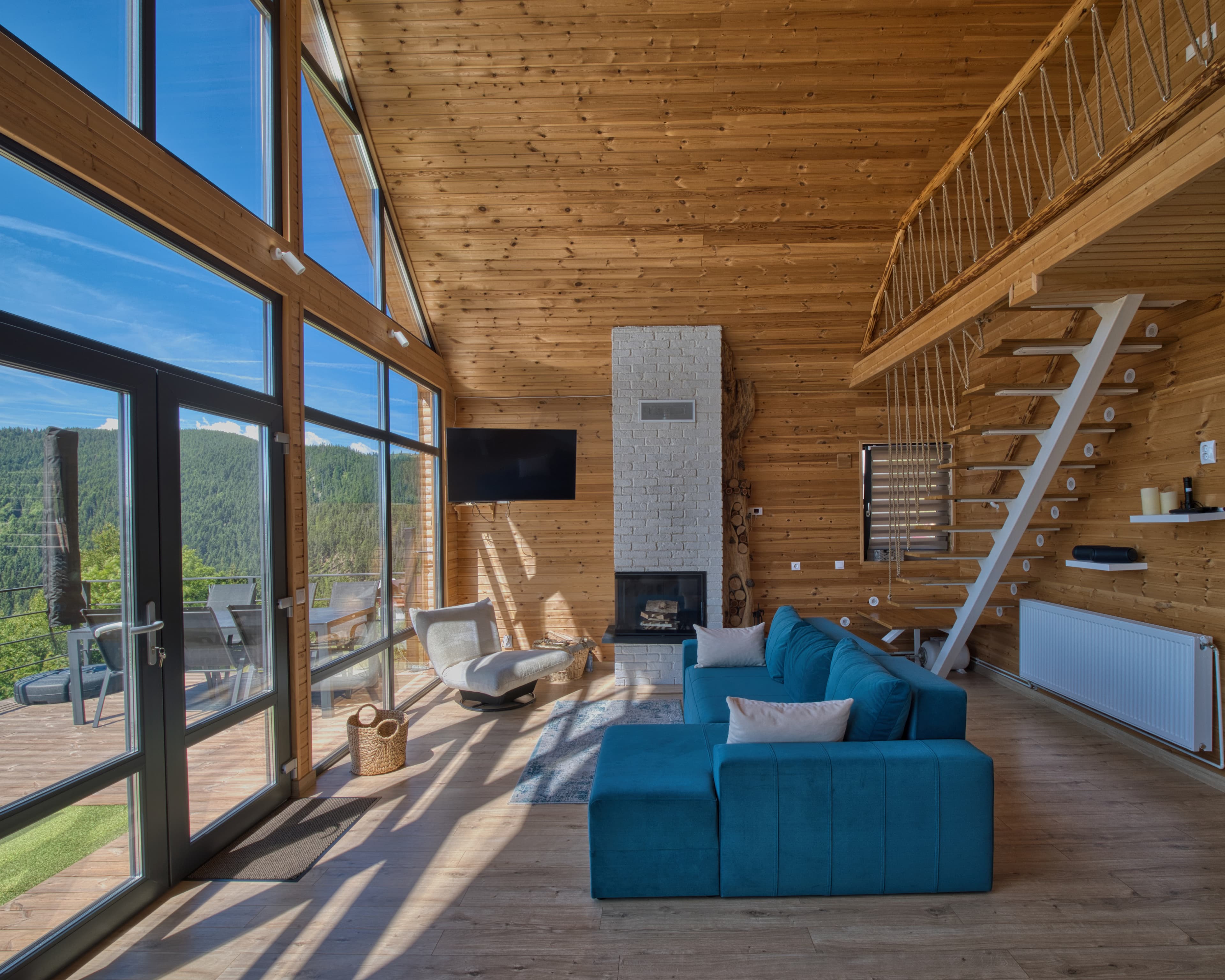 Living room, dinning table, couch with view, chimney